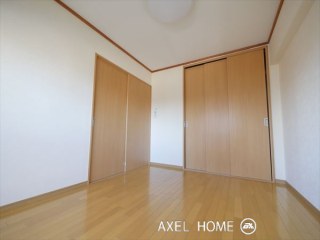 月島ホームズ